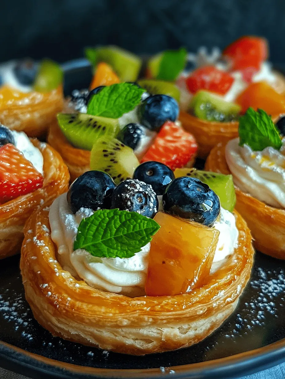 Delight in the exquisite fusion of textures and flavors with Puff Pastry Fruit Tarts topped with Lemon Curd Whipped Cream. These elegant tarts are not just a feast for the eyes, but also an indulgent treat for the palate. The delicate layers of golden, flaky puff pastry serve as the perfect base, while a luscious layer of tangy lemon curd meets the airy sweetness of whipped cream. Crowned with vibrant, fresh fruits, these tarts are a standout choice for any occasion, be it family gatherings, festive parties, or simply a refreshing dessert that celebrates the bounty of seasonal produce.